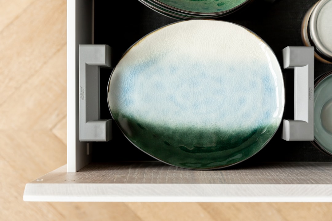 Plates in plates carrier inside a kitchen drawer